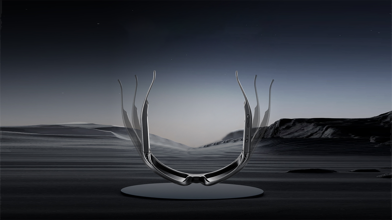 Futuristic smart glasses displayed from the rear against a dark desert landscape background