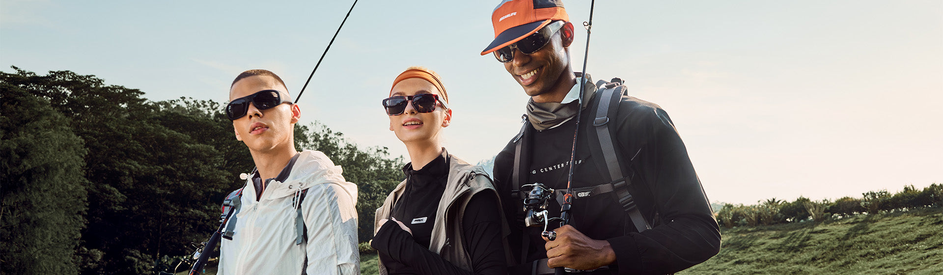 Three anglers with fishing rods outdoors wearing OhO Sunshine polarized camera sunglasses