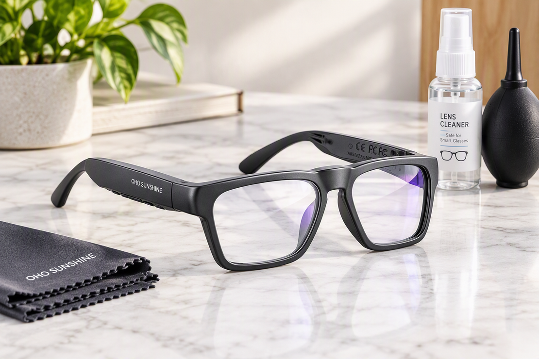 Smart glasses resting on a clean surface beside a microfiber cloth and approved lens-cleaning supplies.