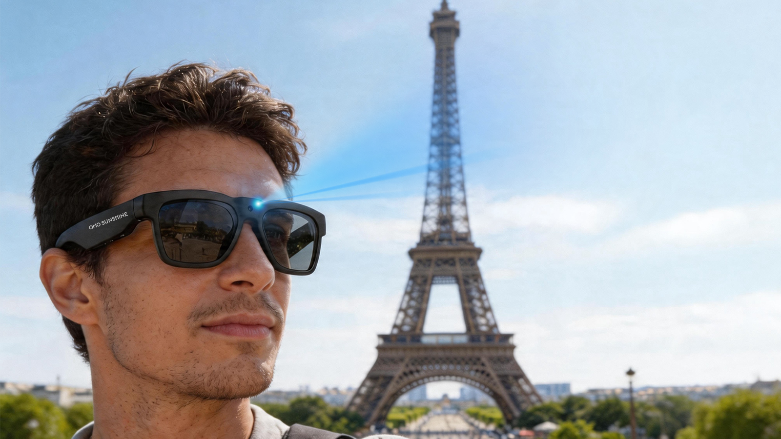 Man wearing smart sunglasses in front of the Eiffel Tower on a sunny day